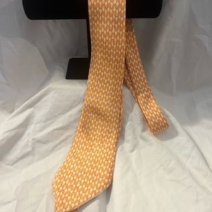 Hermes ties in Orange Chain Link design in 100% silk.